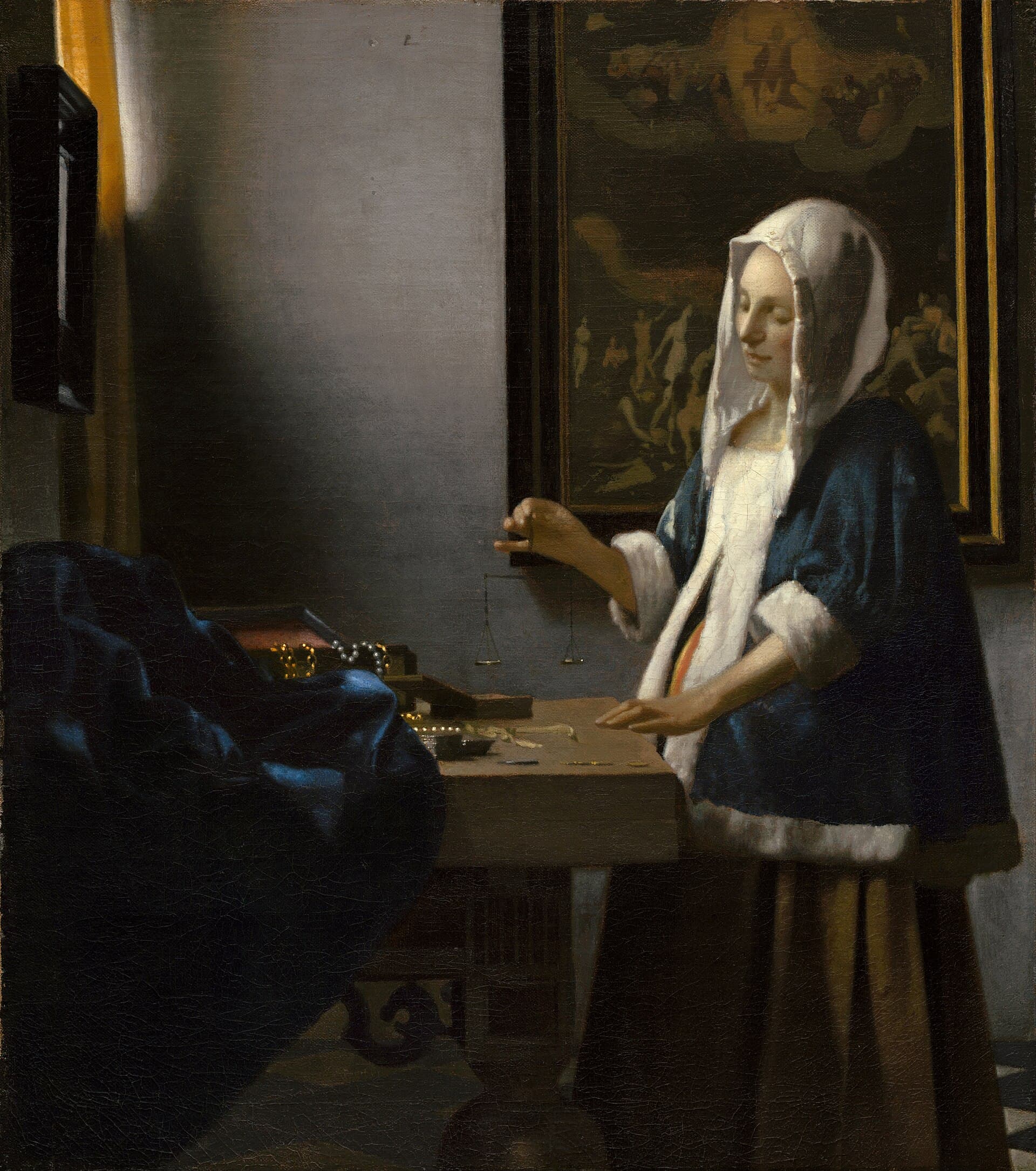 Woman Holding a Balance. Johannes Vermeer, 1664